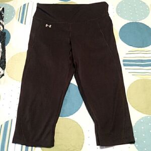 Under Armour, compression shorts. Side zippered pocket, high waist